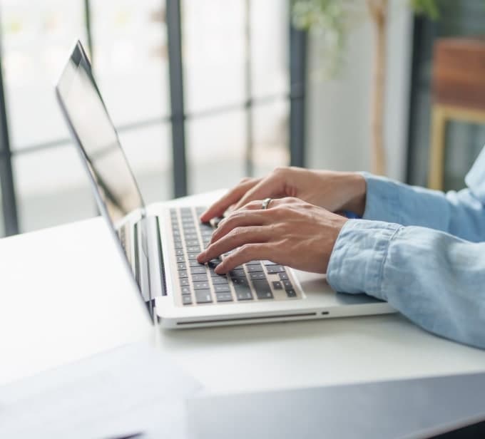 Person working on a laptop